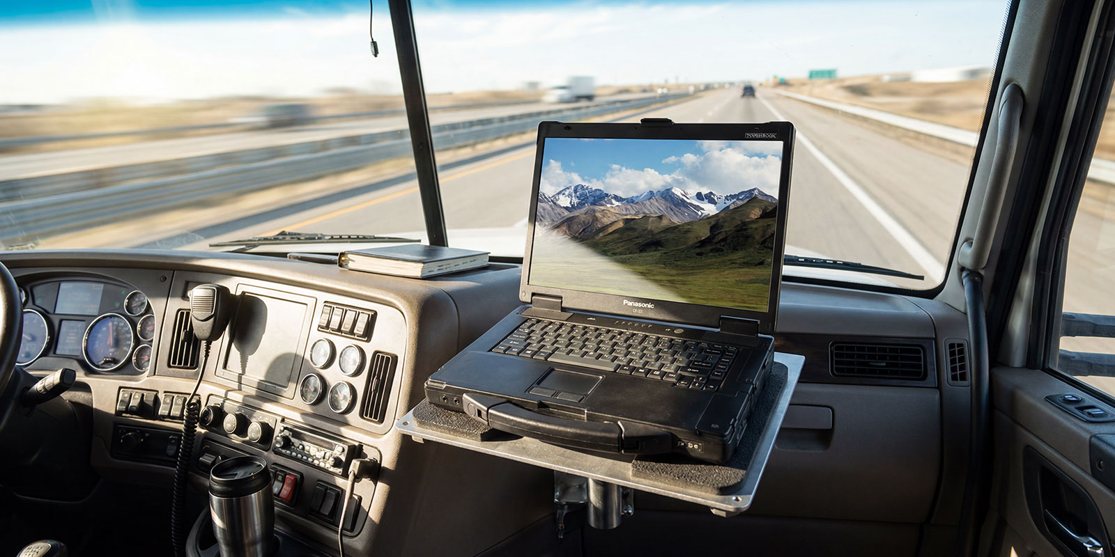 operating laptop in fast moving truck